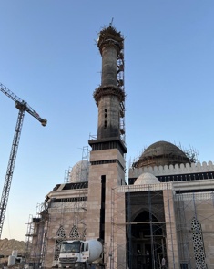 Minaret under construction with slipform equipment at Al Shohada